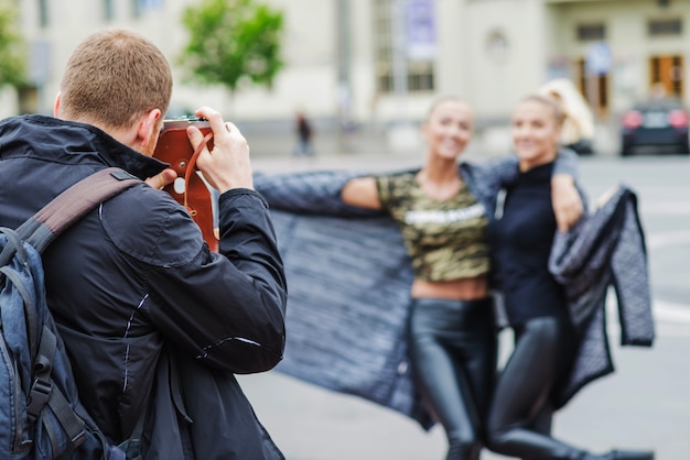 Women posing for photographer