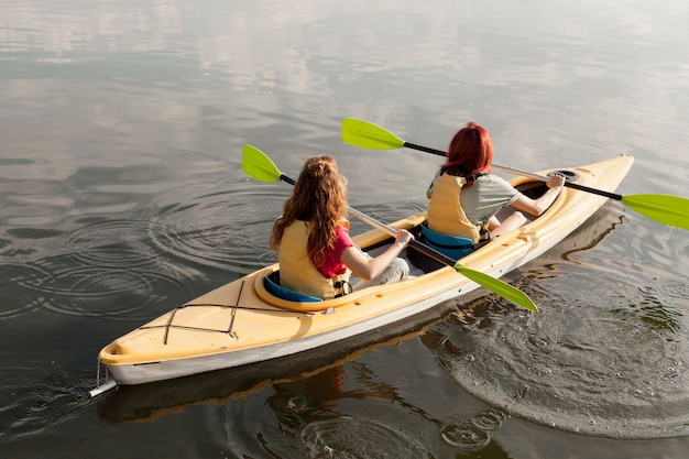 Women rowing in kayak