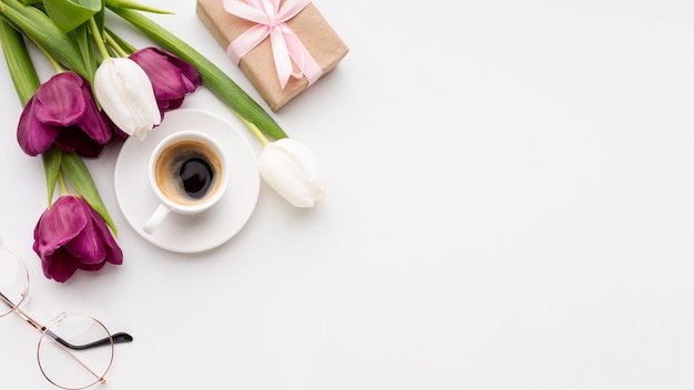 Women's day assortment on white background with tulips and copy space