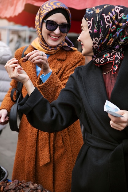 Women shopping for ramadan front view