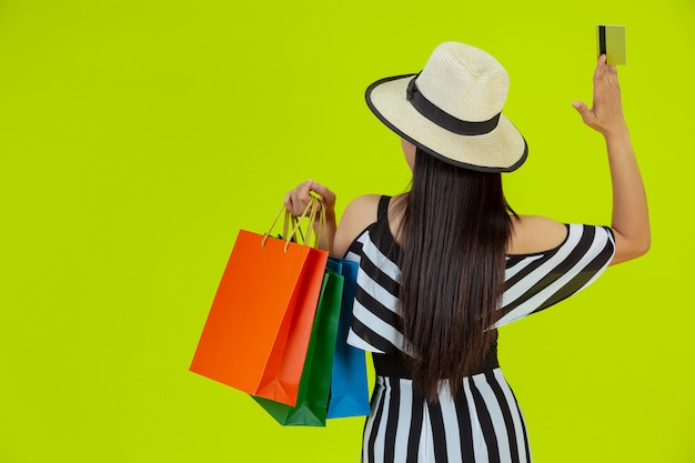 women shopping with shopping bags and credit cards