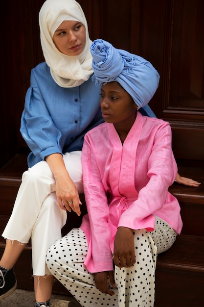 Women sitting on stairs high angle