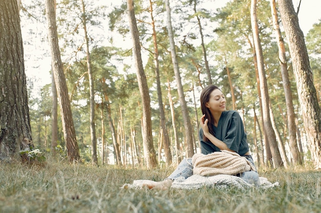 Free photo women sitting in a summer park and knitting