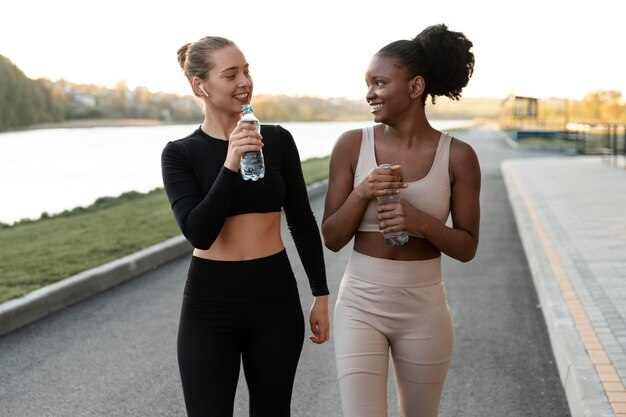 Women in sportswear taking a break from workout