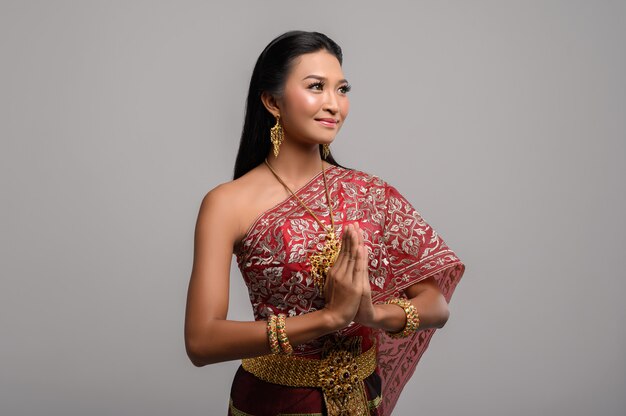 Women wearing Thai clothing that Pay respect,sawasdee symbol