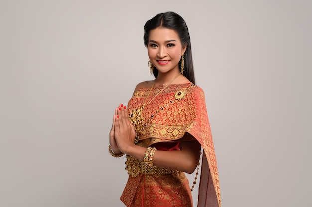 Women wearing Thai clothing that Pay respect,sawasdee symbol