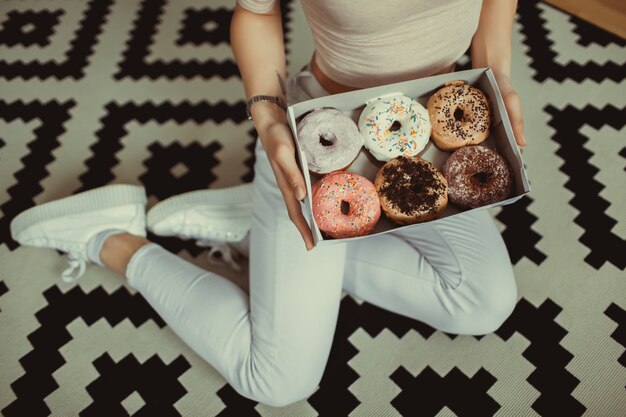 Free photo women with donuts