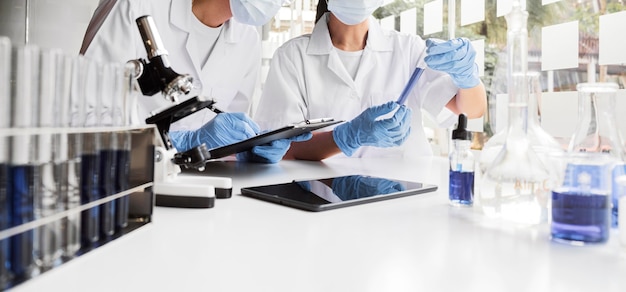 Women working on a chemical project for a new discovery