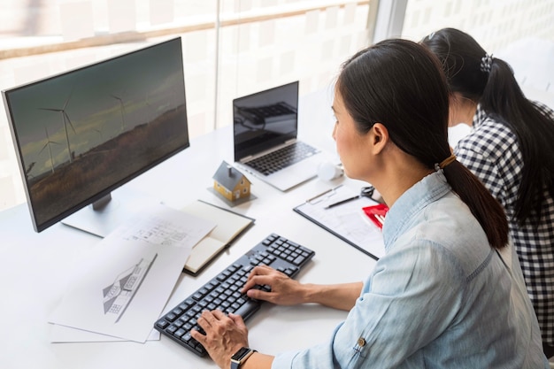 Women working hard together for an innovation