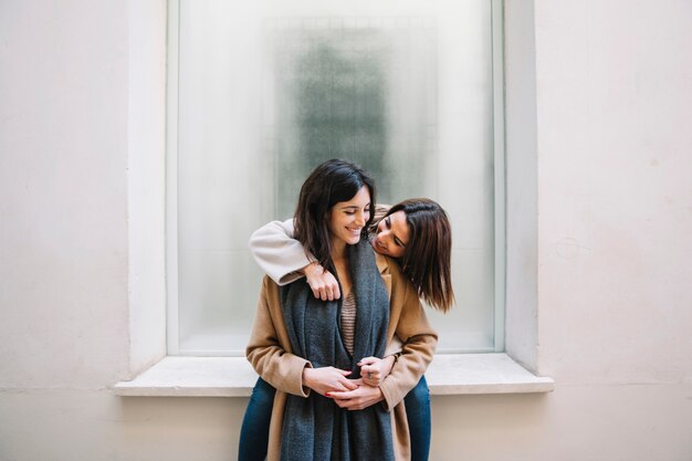 Wonderful romantic women posing on street