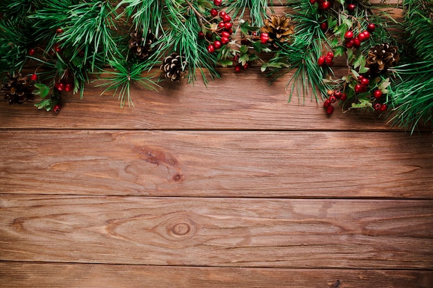 Free photo wood board with christmas twig