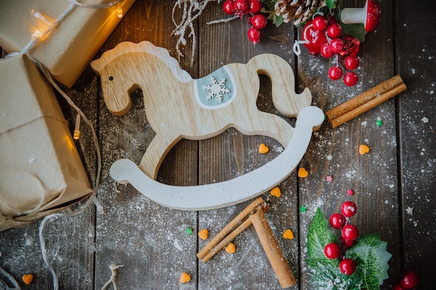 Free photo wood horse on the christmas table