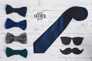 Free photo wooden background with father's day objects