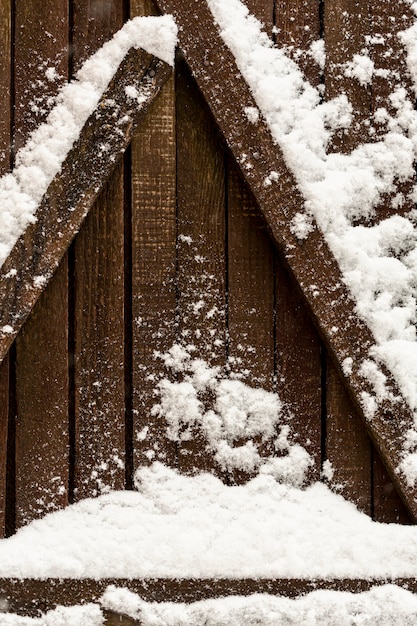 Free Photo wooden beams with snow