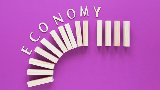 Free Photo wooden blocks with economy report