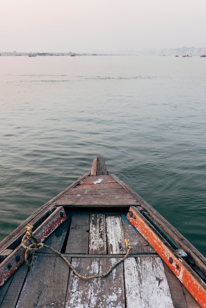 Free photo wooden boat sailing on the river ganges in varanasi, india