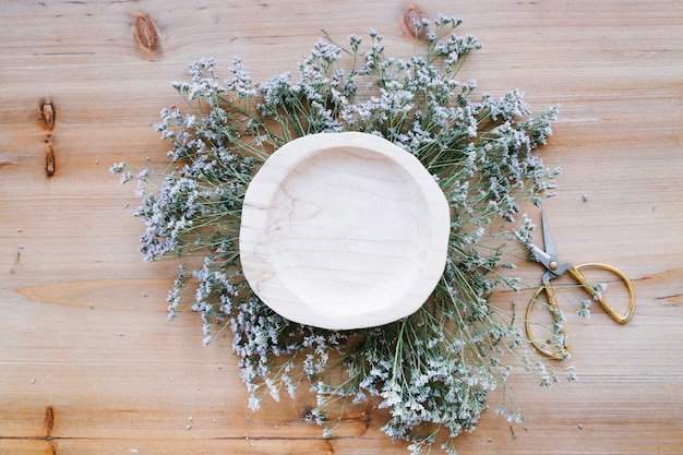 Wooden bowl with flowers