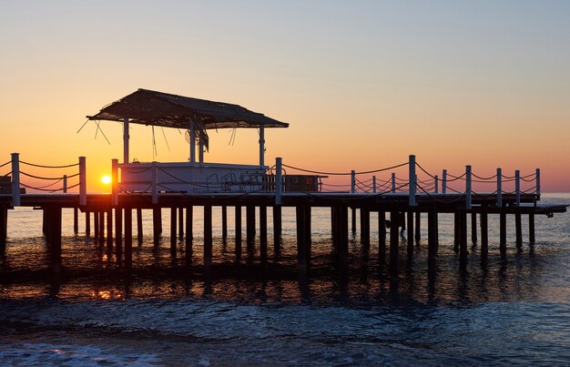 Wooden bridge pier against a beautiful sky