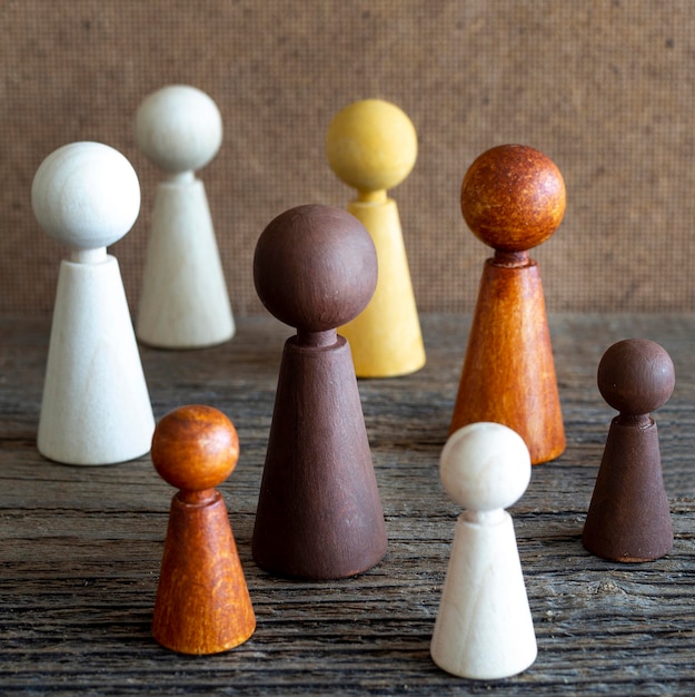 Free Photo wooden chess pieces on table