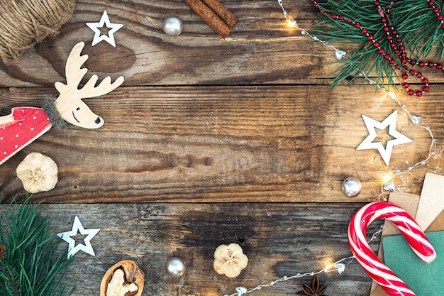 Free Photo wooden christmas background with decor details flat lay