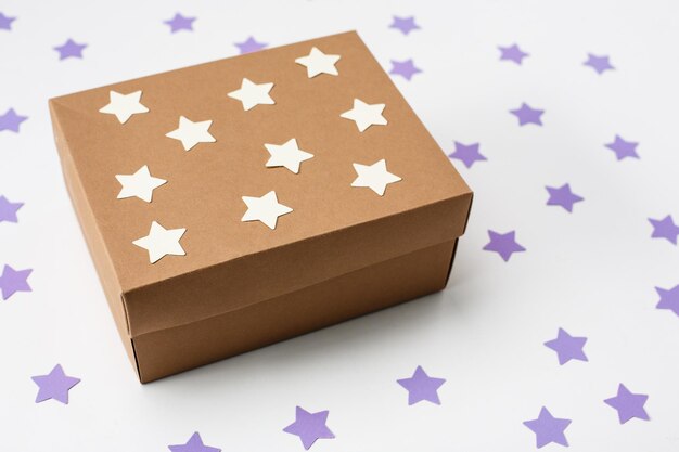 Wooden christmas gift box over white background From above