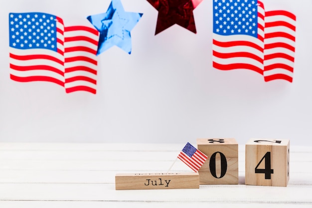 Free Photo wooden cubes with date of independence day of america 