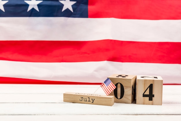 Free Photo wooden cubes with date of independence day of america 