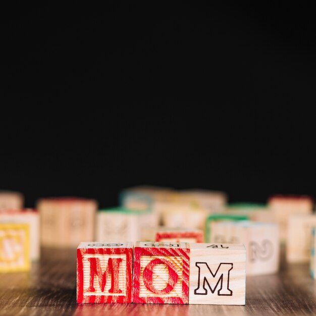 Wooden cubes with mom inscription