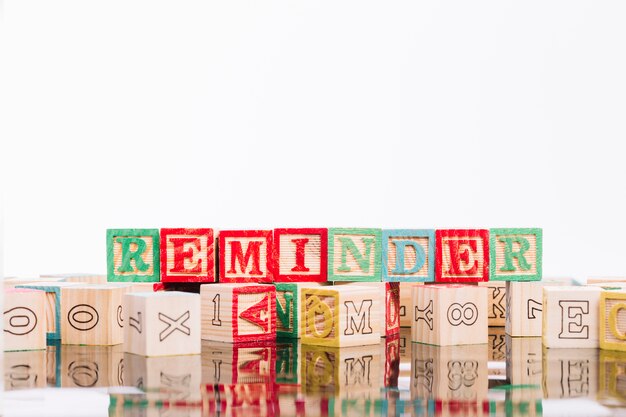 Wooden cubes with reminder inscription