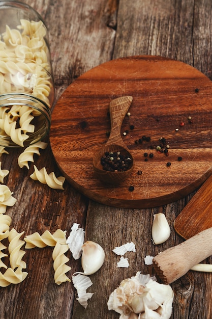 Wooden equipment on kitchen counter with spices