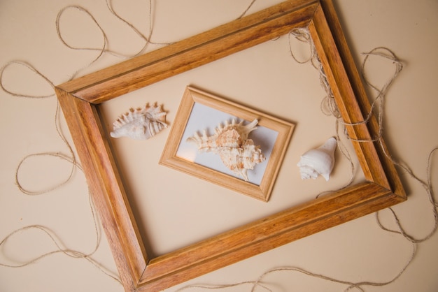 Free photo wooden frames and ribbons