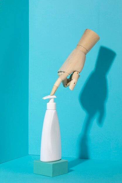 Wooden hand with hygienic soap