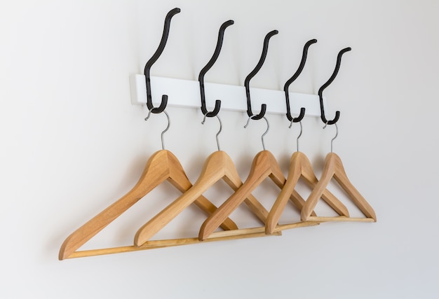 Free photo wooden hangers hanging