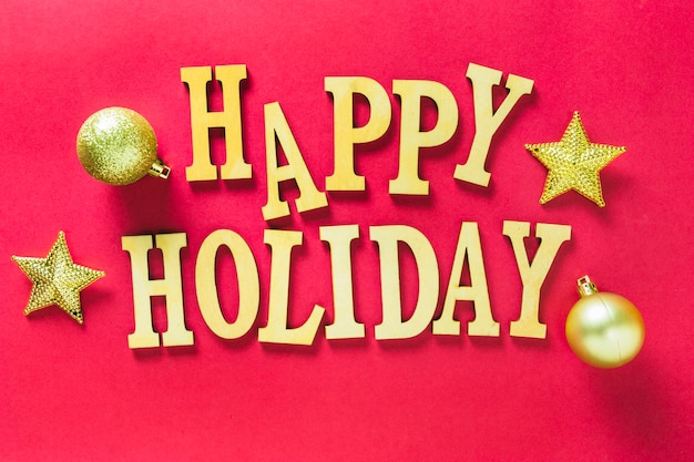 Free photo wooden happy holiday lettering