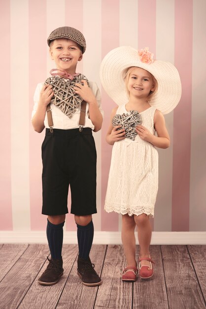 Wooden hearts in children's hands