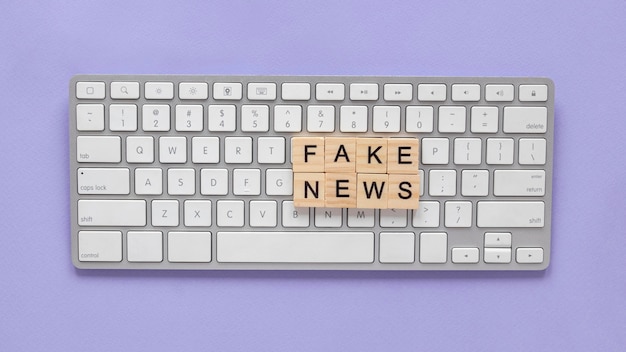 Wooden letters forming fake news