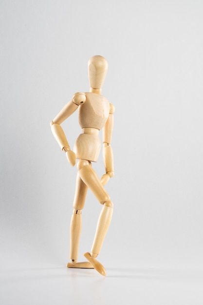 Free photo wooden pose doll posed like walking