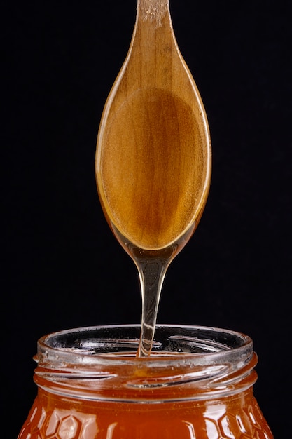 Free Photo wooden spoon with honey