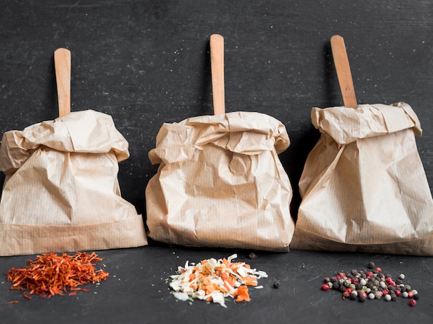 Wooden spoons inside paper bags