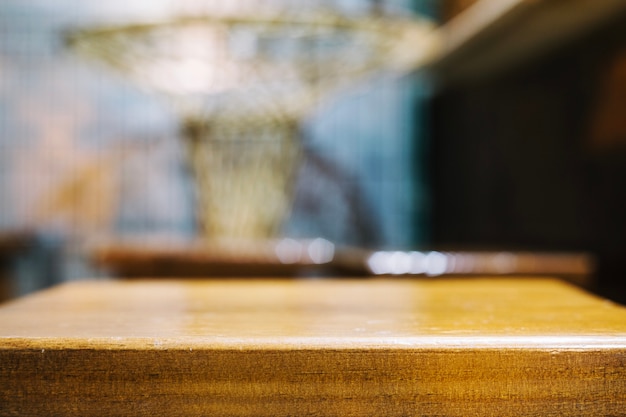 Free Photo wooden stool on blurred background