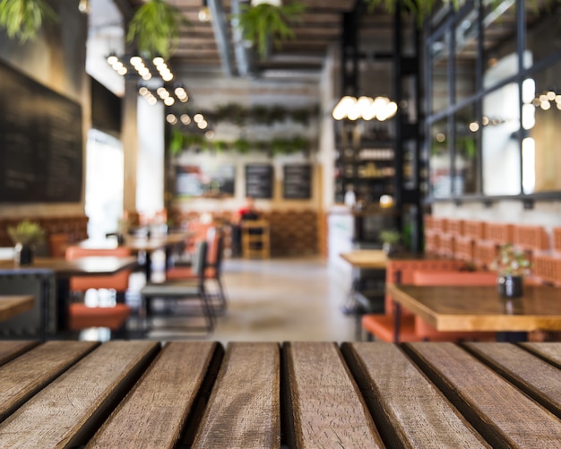 Wooden surface looking out to empty restaurant