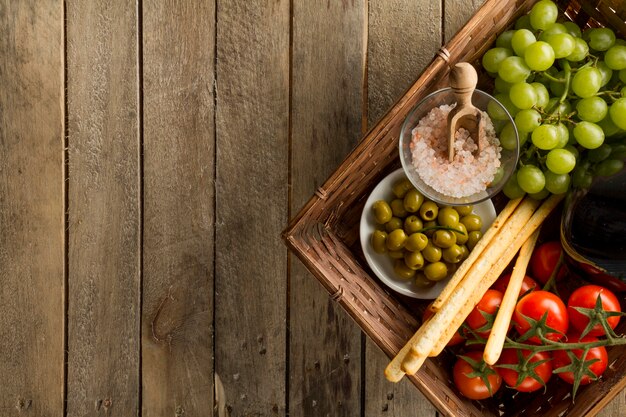 Wooden surface with basket and healthy products