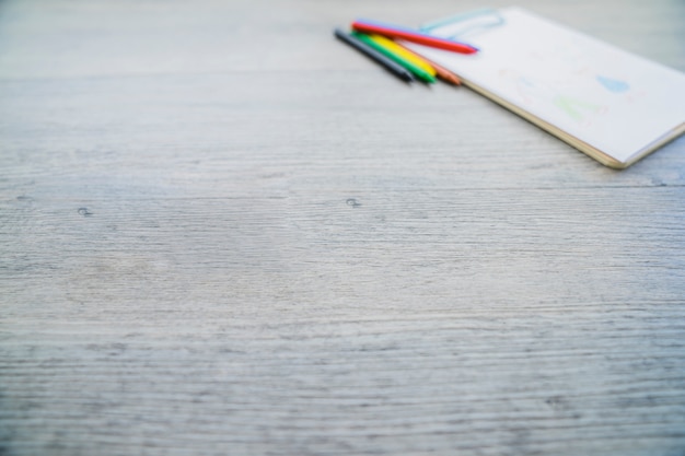 Free photo wooden surface with blurred drawing for father's day