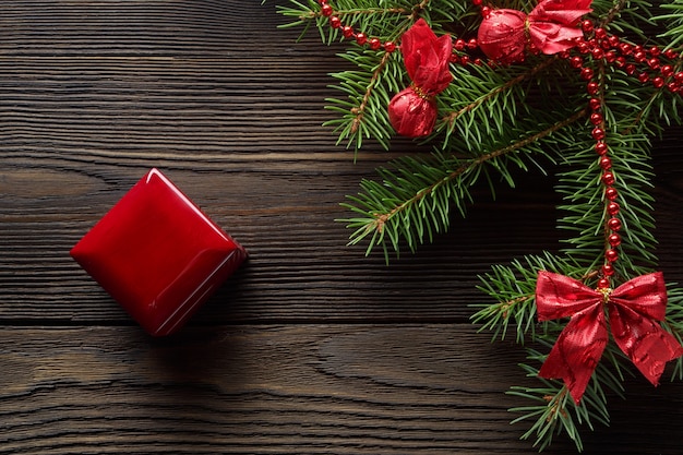 Free photo wooden table with a closed red box