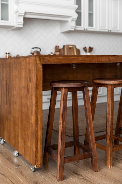 Free Photo wooden table with wheels in kitchen