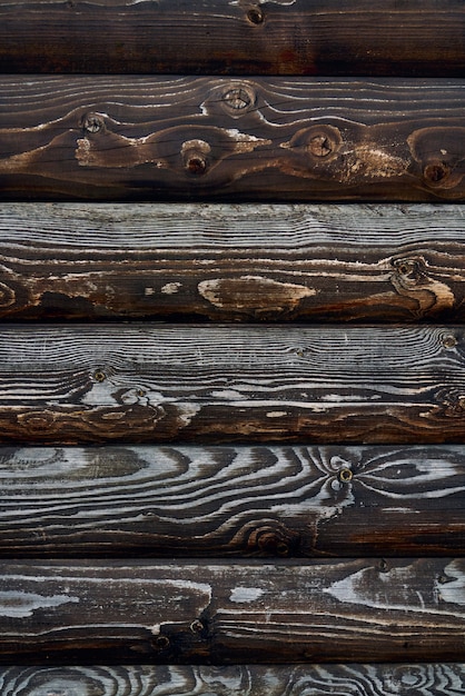 Free Photo wooden texture of dark brown planks.