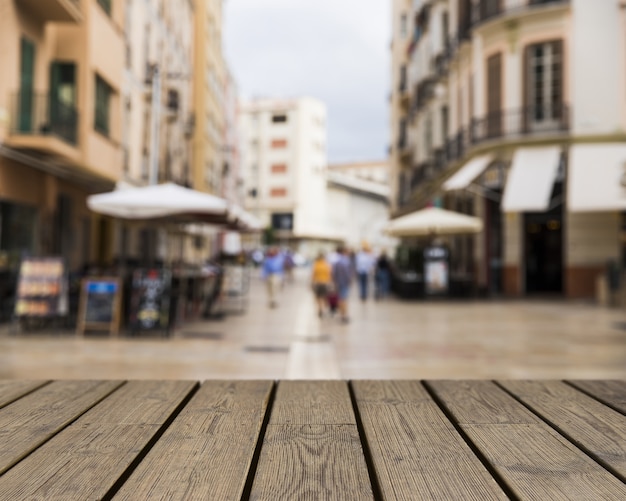 Free Photo wooden texture looking out to city