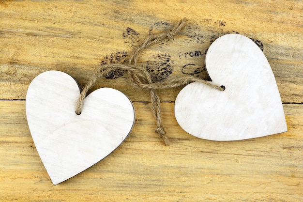 Free Photo wooden white hearts on a wooden surface