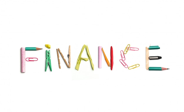 The word finance created from office stationery.