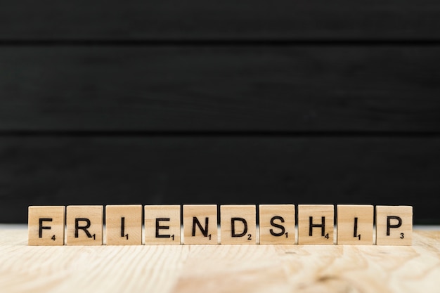 Free Photo the word friendship spelt with wooden letters